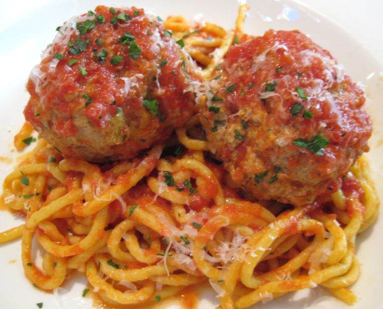 A plate of spaghetti and meatballs infused with Italian and Asian flavors.